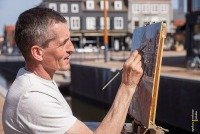 Kunstenaar schildert haven